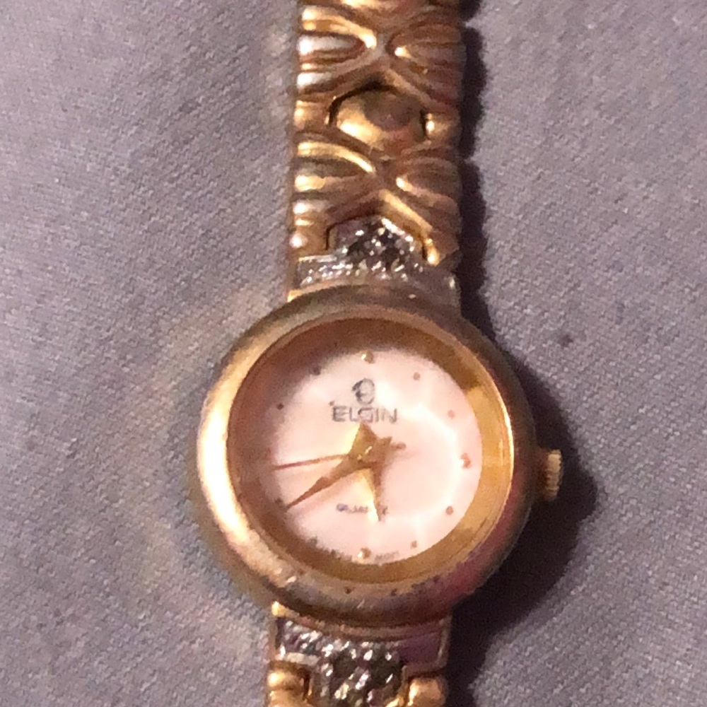 Elgin Woman’s Gold & Diamond Stretch Band Watch